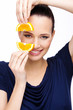 Smiled girl with an orange
