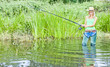 Photo: woman fishing in pond woman fishing in pond