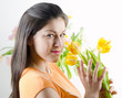 Photo: Beautiful happy woman with tulips Beautiful happy woman with tulips