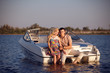 young couple on the boat