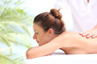 Brunette girl receiving a massage
