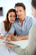 Young couple meeting financial adviser
