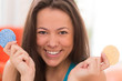 Photo: Young woman with cosmetic pillows Young woman with cosmetic pillows