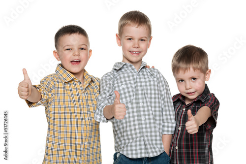 Photo: Three cheerful cute boys Three cheerful cute boys