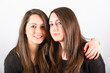 Two Beautiful Twin Sisters Embraced
