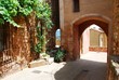 Houses behind an arc in Roussillon village, Provence, France
