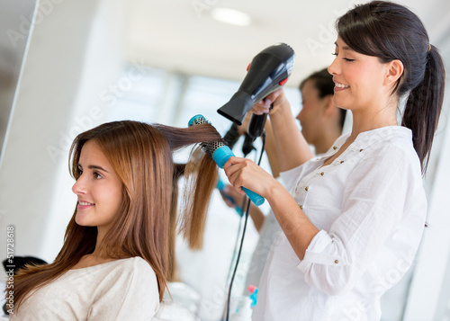 Photo: Stylist drying hair Stylist drying hair