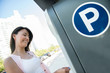 Woman paying for parking