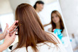 Photo: Woman cutting her hair Woman cutting her hair