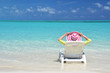 Foto: Girl in a striped hat on the beach of Exuma, Bahamas Girl in a striped hat on the beach of Exuma, Bahamas
