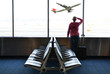 Foto: Girl at the airport window Girl at the airport window