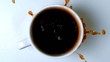 Video: Sugar cubes falling in cup of coffee Sugar cubes falling in cup of coffee