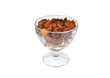 Raisin in glass bowl, isolated on white background