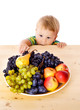 Photo: Baby with dish of fruit Baby with dish of fruit
