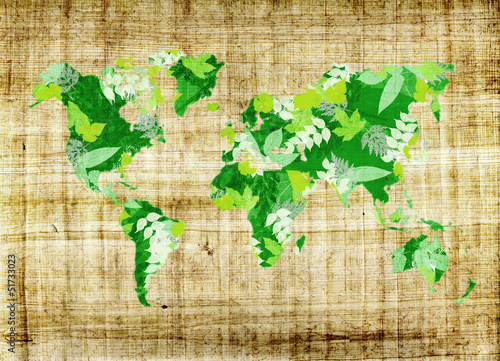 Photo: Carte du monde feuilles, texture vintage Carte du monde feuilles, texture vintage