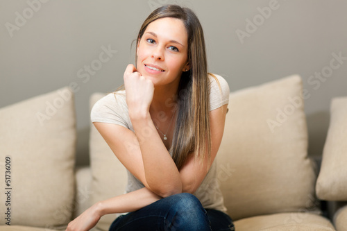 Photo: Young and beautiful woman on the sofa Young and beautiful woman on the sofa