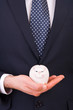 Businessman with piggy bank.