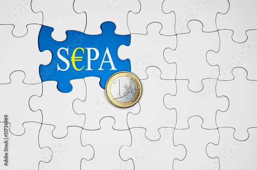 Photo: Puzzle in Blau mit S€PA und Euromünze Puzzle in Blau mit S€PA und Euromünze