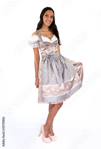 Photo: Wunderhübsche Frau im Dirndl vor weißem Hintergrund Wunderhübsche Frau im Dirndl vor weißem Hintergrund