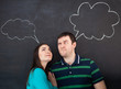Young happy couple thinking. Chalk drawing