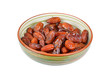 Delicious dried date fruit in bowl, isolated on white