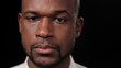 Close up of African American man's face, dolly shot