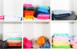 Clothes neatly folded on shelves