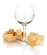 Wineglass and corks isolated on white