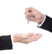Male hand holding apartment keys