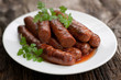Frying sausage with lamb