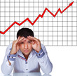 Businessman in front of some rising graphic