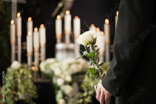 Photo: Religion, death and dolor - man at funeral Religion, death and dolor - man at funeral