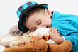 Kind mit Kuscheltieren