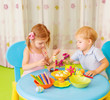 Two kids painted Easter eggs