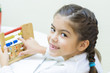 Photo: Schoolgirl at her Desk Schoolgirl at her Desk