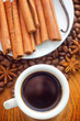 Photo: Fresh aroma coffee in the white cup, coffee and cinnamon Fresh aroma coffee in the white cup, coffee and cinnamon