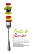 Fresh mixed slices of fruits on a fork
