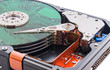 Photo: Hard disk drive and circuit board on it's surface. Hard disk drive and circuit board on it's surface.