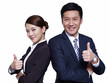 asian business people standing back-to-back, thumbs up
