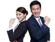asian business people standing back-to-back, making a fist
