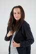 Photo: Young woman with sports jacket Young woman with sports jacket
