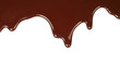 Melted chocolate dripping on white background .