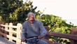 Senior Caucasian man having fun on bicycle