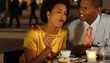 African American couple in cafe with dessert