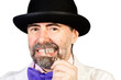 Portrait of happy middle-aged man in a hat with a monocle in his