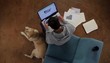Hispanic man working with laptop and cell phone