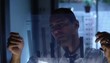 Businessman analyzing transparency graph in office