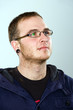 Foto: young man with Piercing and glasses young man with Piercing and glasses