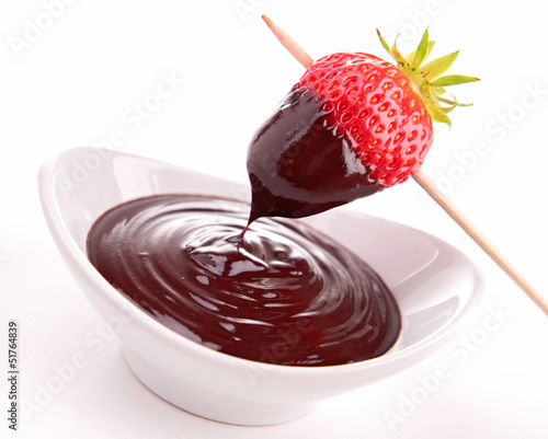 Photo: chocolate sauce and strawberry chocolate sauce and strawberry