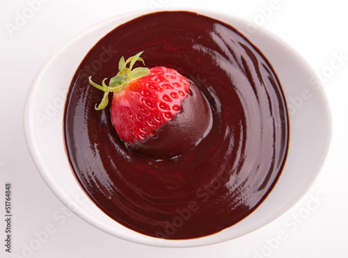 Photo: chocolate sauce and strawberry chocolate sauce and strawberry